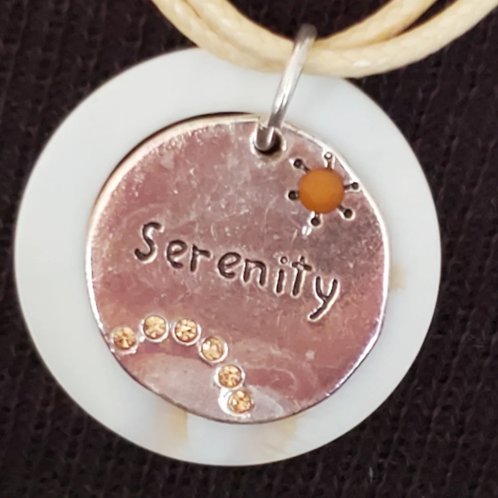Cream and tan boho Serenity pendant cord necklace